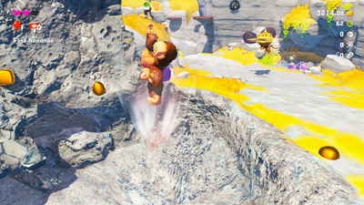 Donkey Kong macht in der Luft einen Schlag nach unten in den Boden