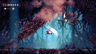Hornet springt in Hollow Knight Silksong in Richtung eines Gegners und attackiert in der Luft