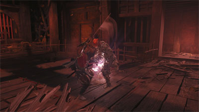 In einem rötlichen Raum mit Holzboden schlägt Miyamoto einen Dämon in Onimusha: Way of the Sword